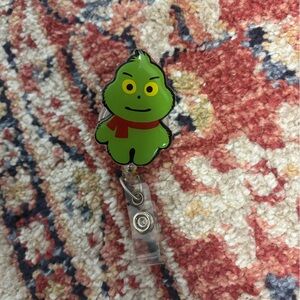 Grinch badge reel!